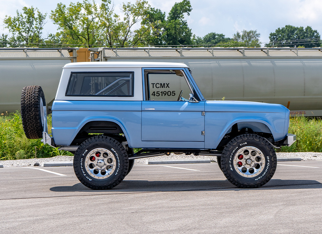 Restored 1971 Ford Bronco - side profile view of the Brittany Blue color.