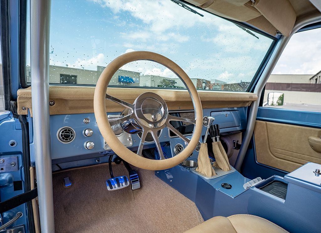 1971 Ford Bronco Restoration - Billet steering wheel with cashew leather grip and polished aluminum spokes.