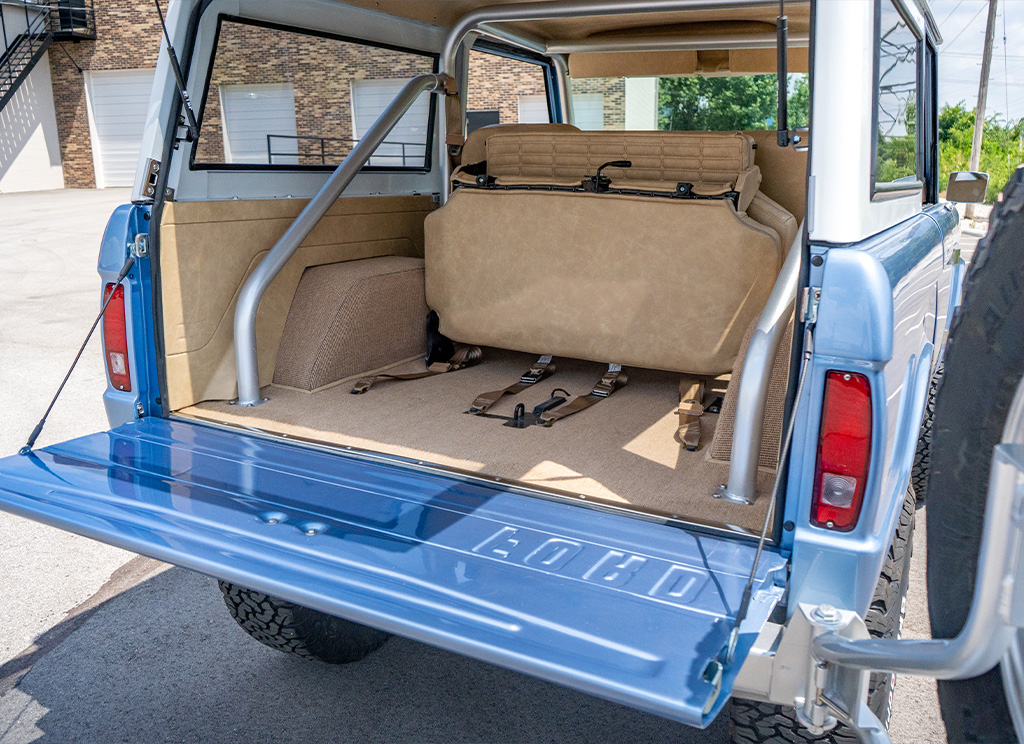 View of the trunk and added rear bench seat on a 1971 Ford Bronco restoration.
