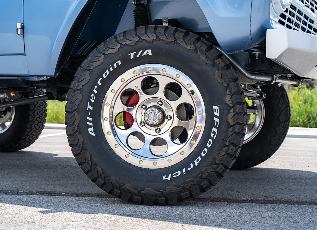 Mickey Thompson's Classic Pro design in polished aluminum with white lettered BF Goodrich KO2 all terrain tires.