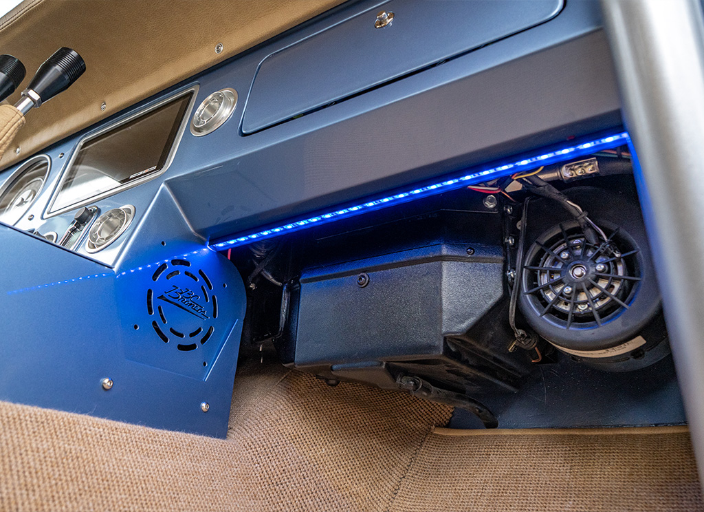 Blue LED light strip under dash of a restored 1971 Ford Bronco. 