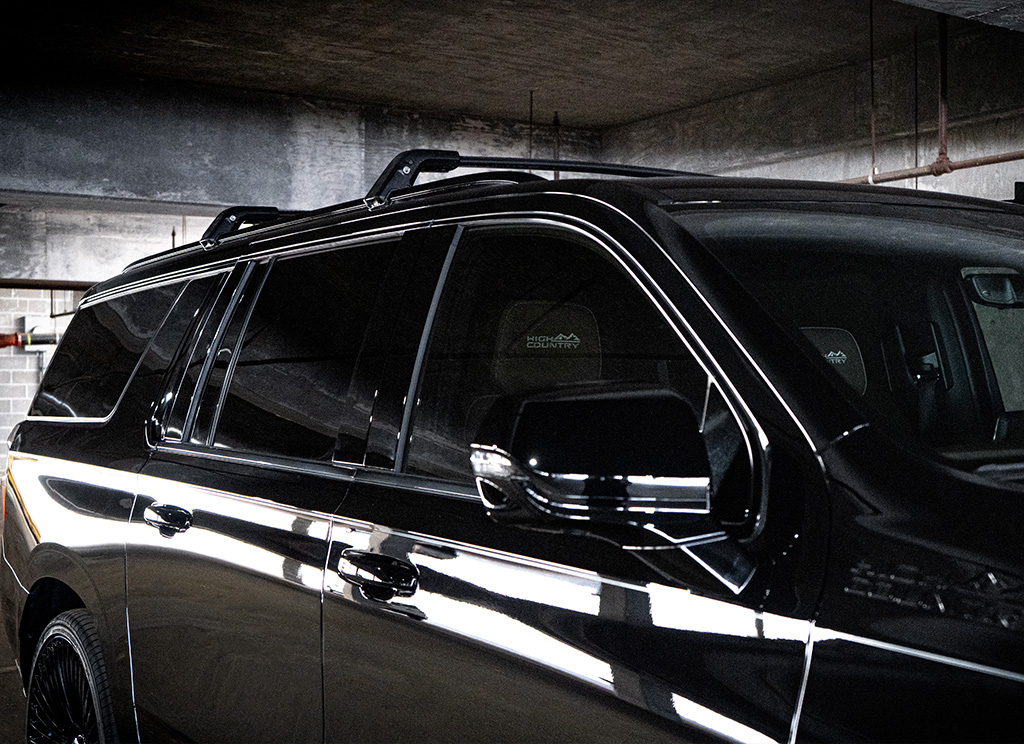 Blackout 2024 Chevy Suburban with black window molding.