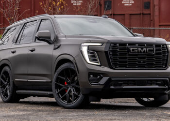 Custom 2026 GMC Yukon Denali with a lowering kit and satin gray wrap.