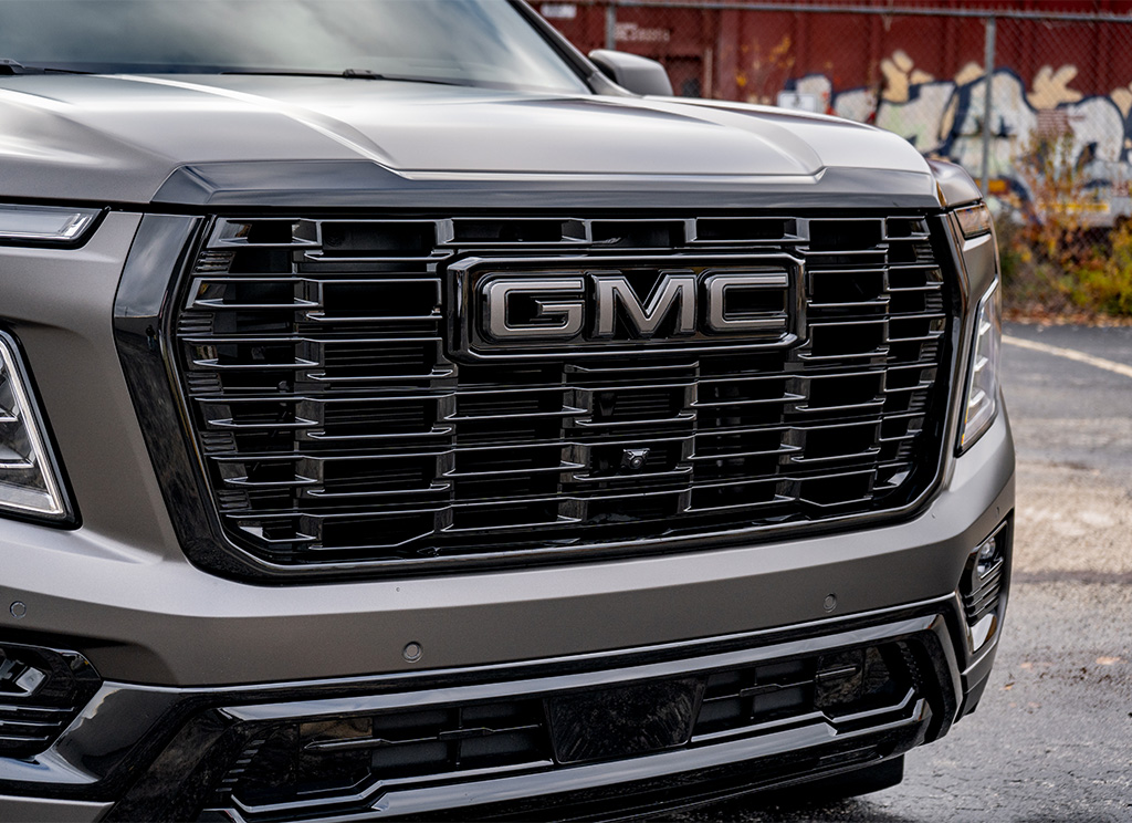 Blackout 2026 GMC Yukon Denali Grille with custom satin gray GMC emblem.