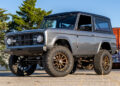 Restored metallic gray 1972 Ford Bronco with modern restomod upgrades.