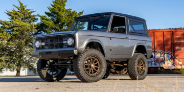 Restored metallic gray 1972 Ford Bronco with modern restomod upgrades.