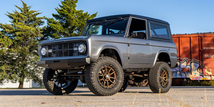 Restored metallic gray 1972 Ford Bronco with modern restomod upgrades.