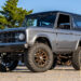 Restored metallic gray 1972 Ford Bronco with modern restomod upgrades.