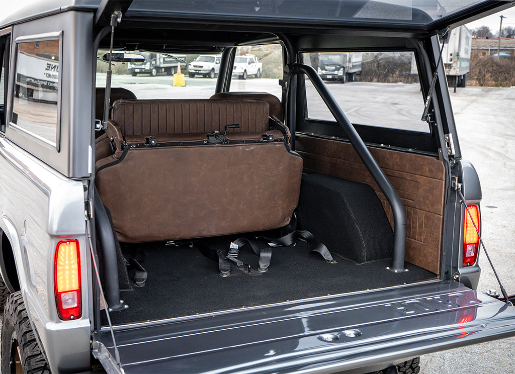 View of the trunk and added rear bench seat on a 1972 Ford Bronco restoration.