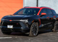 Black 2025 Chevrolet Blazer EV with a red roof wrap.