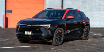 Black 2025 Chevrolet Blazer EV with a red roof wrap.