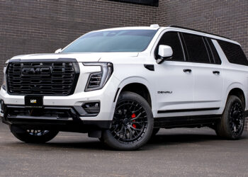 White 2026 GMC Yukon Denali with blackout chrome delete trim and custom accessories.