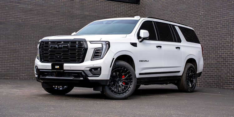 White 2026 GMC Yukon Denali with blackout chrome delete trim and custom accessories.