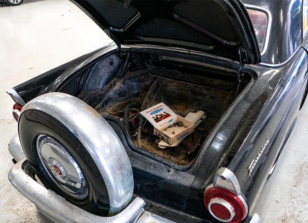 Old black 1956 Ford Thunderbird trunk.
