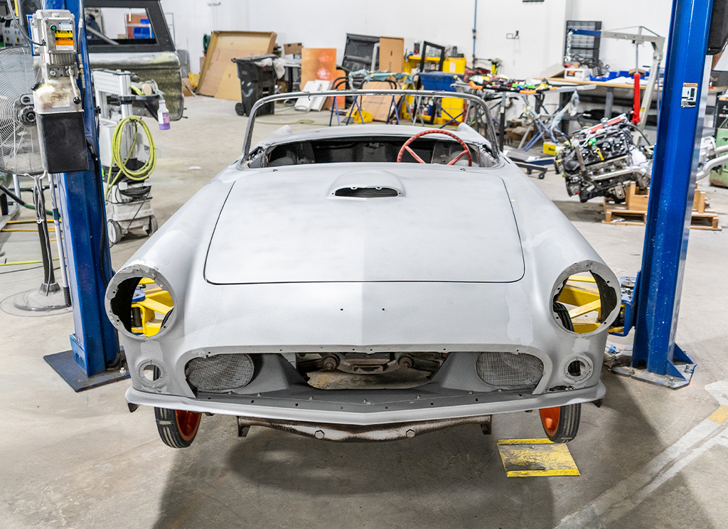 Stripped front-end exterior of a 1956 Ford Thunderbird.