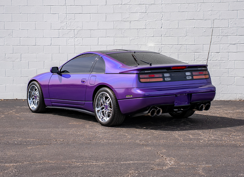 Rear hero view of a custom purple 1991 Nissan 300ZX twin turbo.