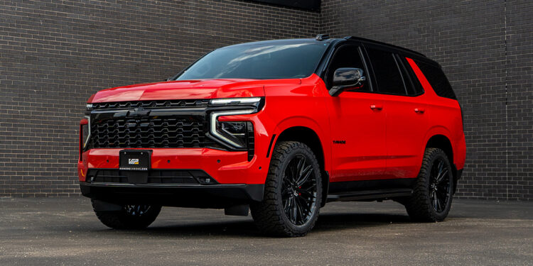 Victory Red 2026 Chevy Tahoe with black chrome delete trim.