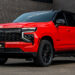 Victory Red 2026 Chevy Tahoe with black chrome delete trim.